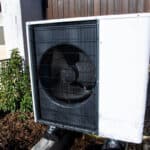 Air and water heat pump on a residential home